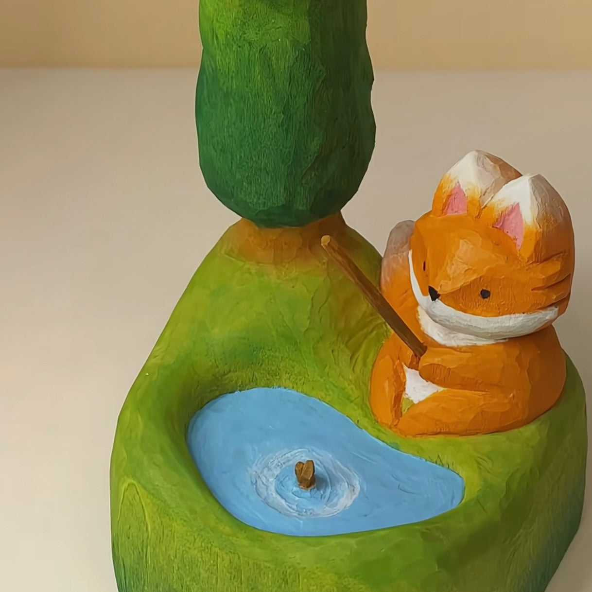 Hand-Carved Wooden Fox Fishing by a Pond – Whimsical Nature Decor